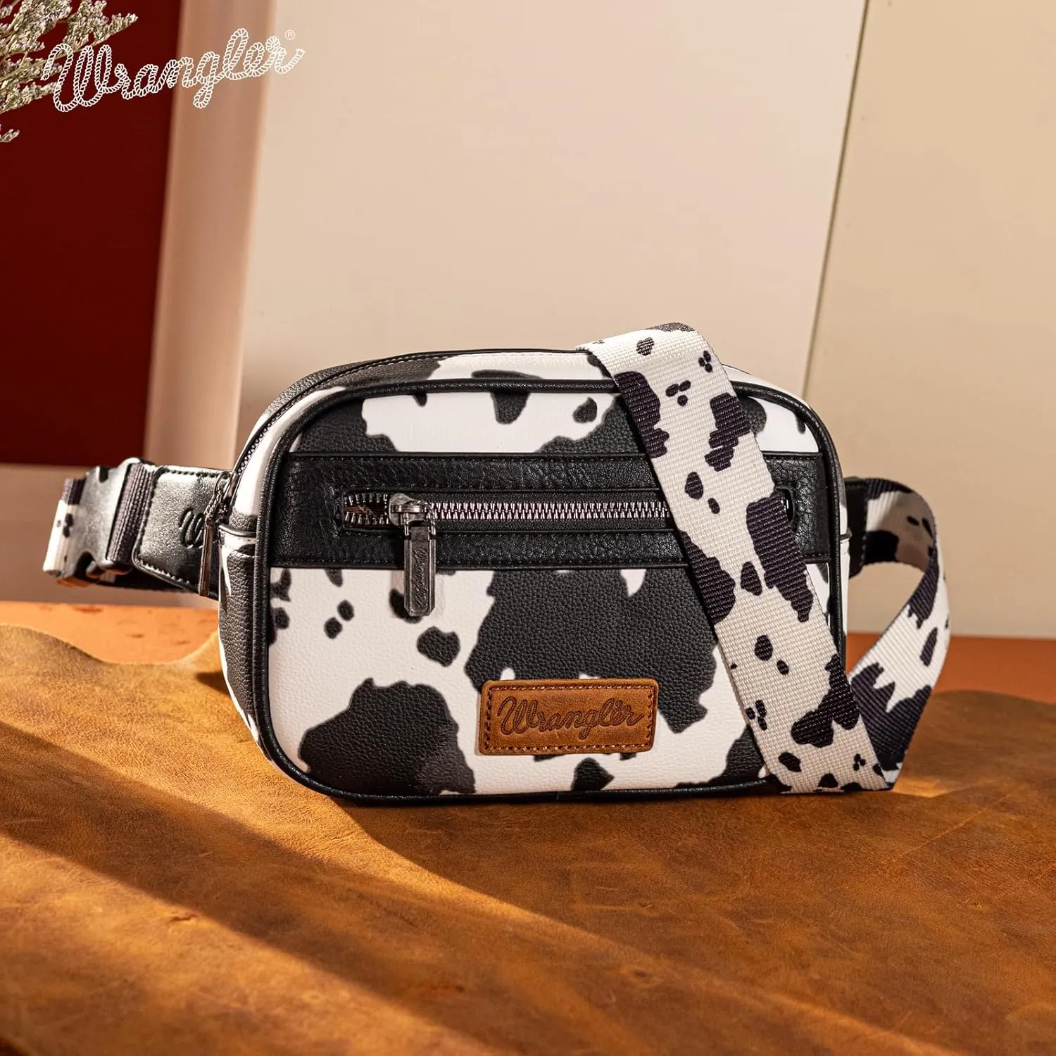 Wrangler Waist Pack for Women Cow Print Fanny Pack Men's Crossbody Belt Bag, Black